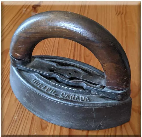 Assorted Antique Sad Irons and Trivet image indicator(3)