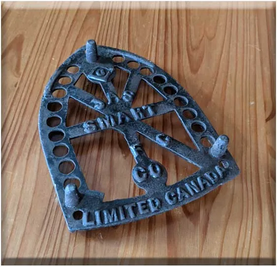 Assorted Antique Sad Irons and Trivet image indicator(5)