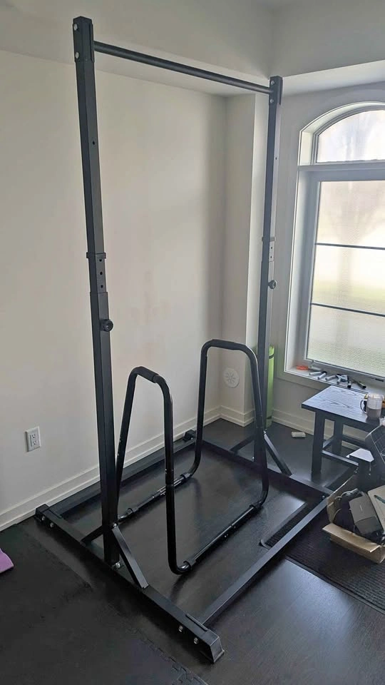 Dip/row bars adjustable/folds flat