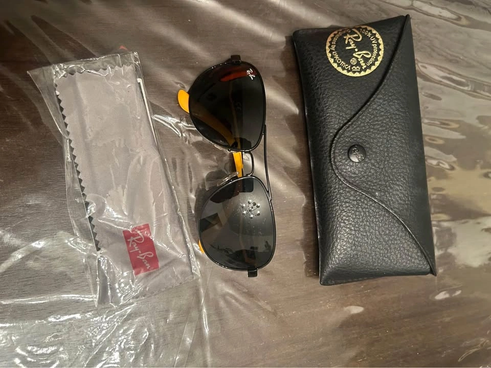 Boy black and orange sunglasses