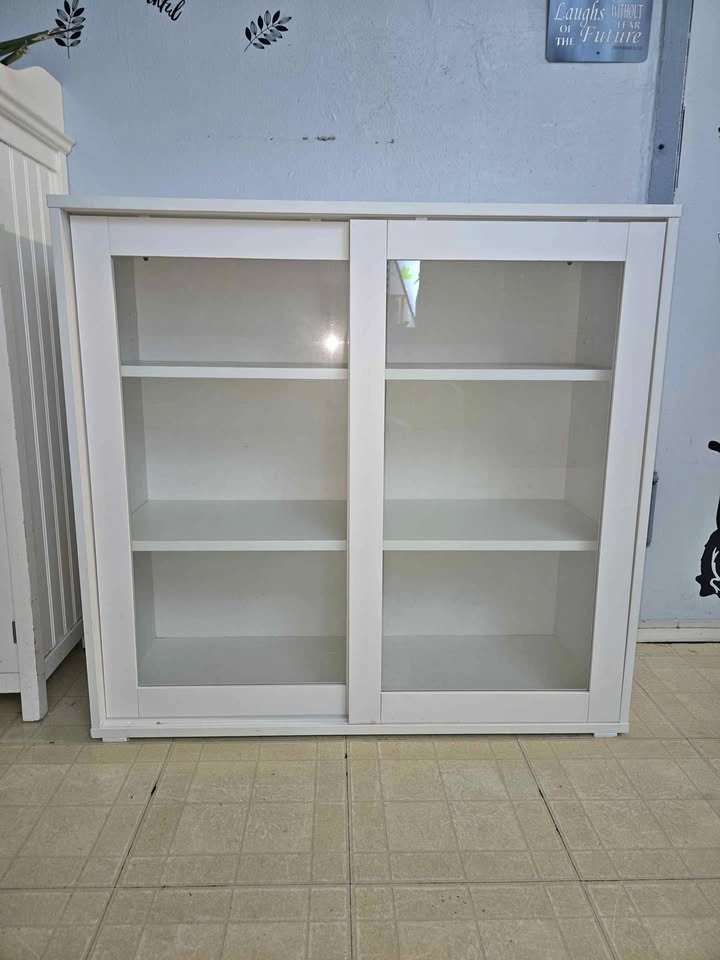 White Cabinet w Sliding Glass Doors