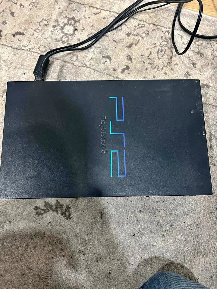 PS2 console + God of War game