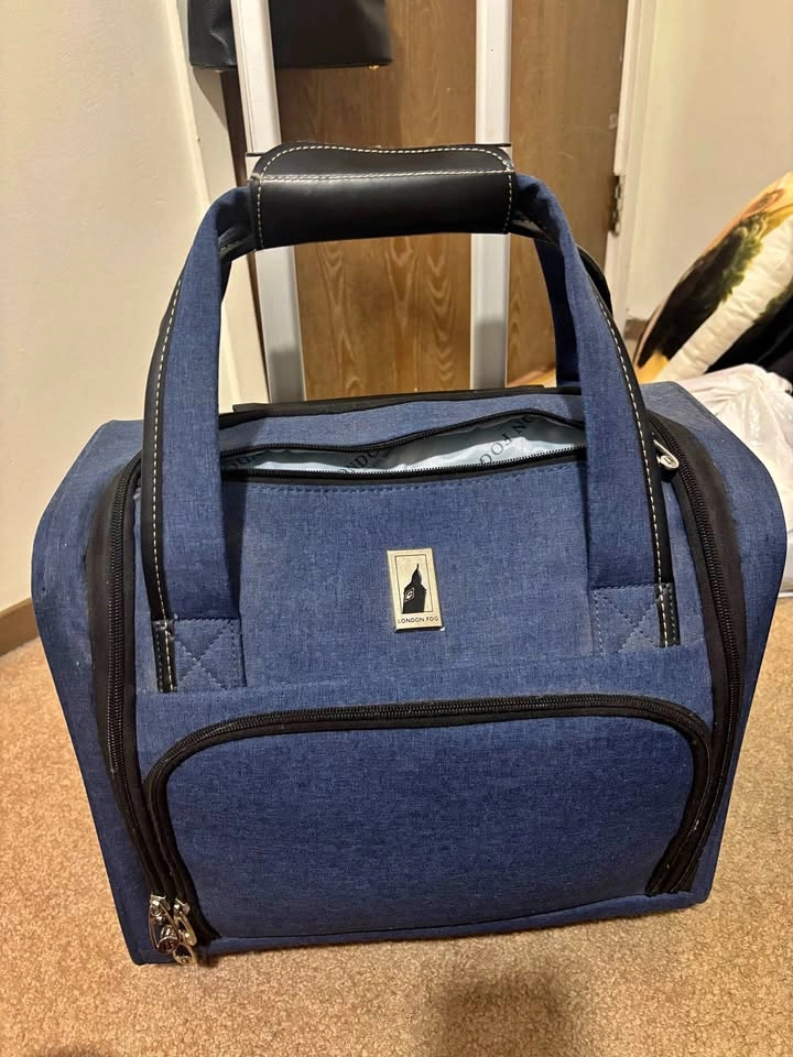 London Fog Rolling Suitcase
