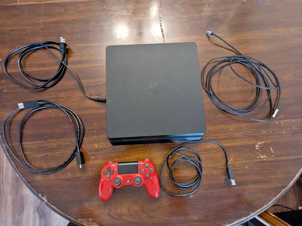 PS4 Console with Red Controller and All Cables