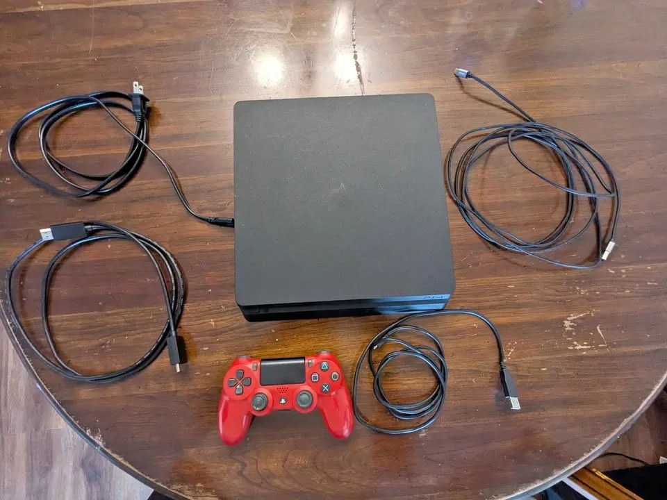 PS4 Console with Red Controller and All Cables