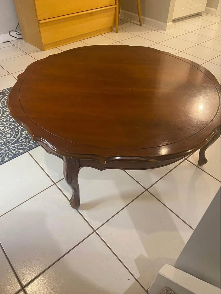 Round mahogany coffee table.
