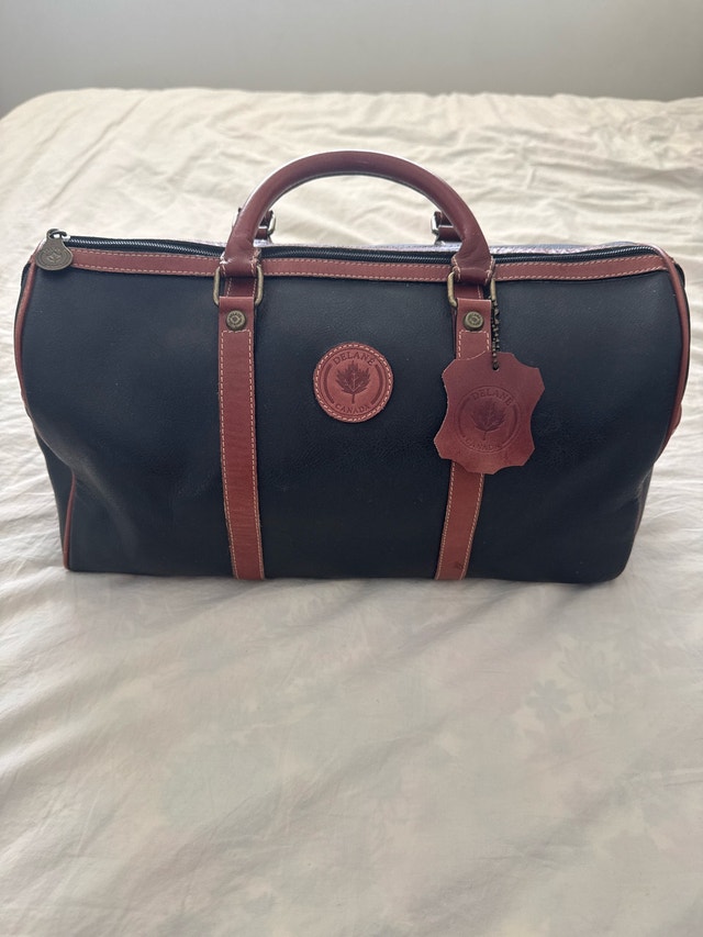 Delane Canada Leather Duffel Bag (Good Condition)