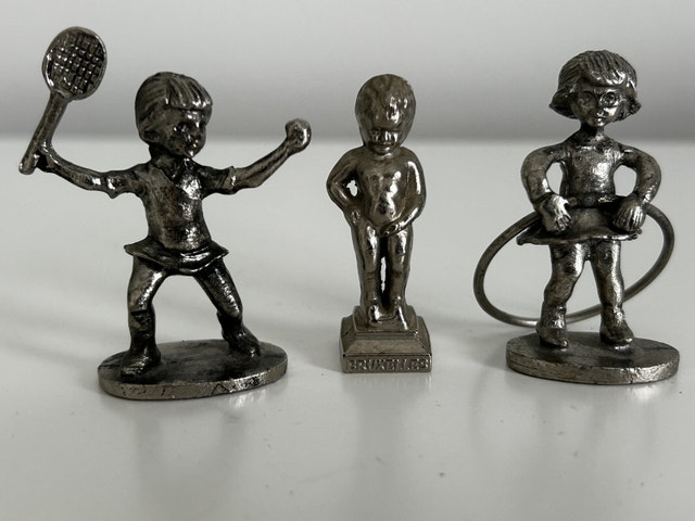 Small metal figurines: Tennis Player Girl and Girl with a hoop
