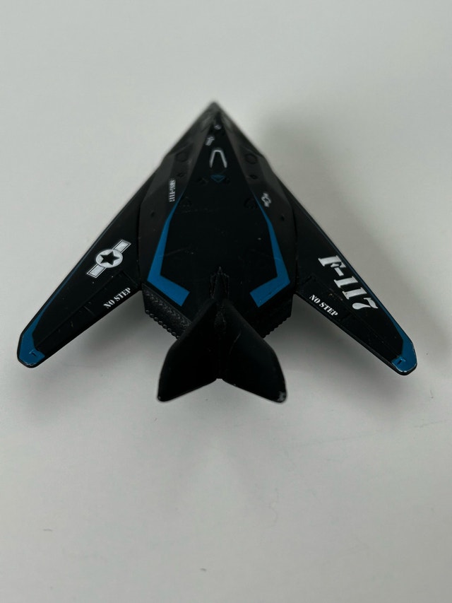 Matchbox F-117 Night Hawk 2010 Black Blue Stealth Fighter - photo 2