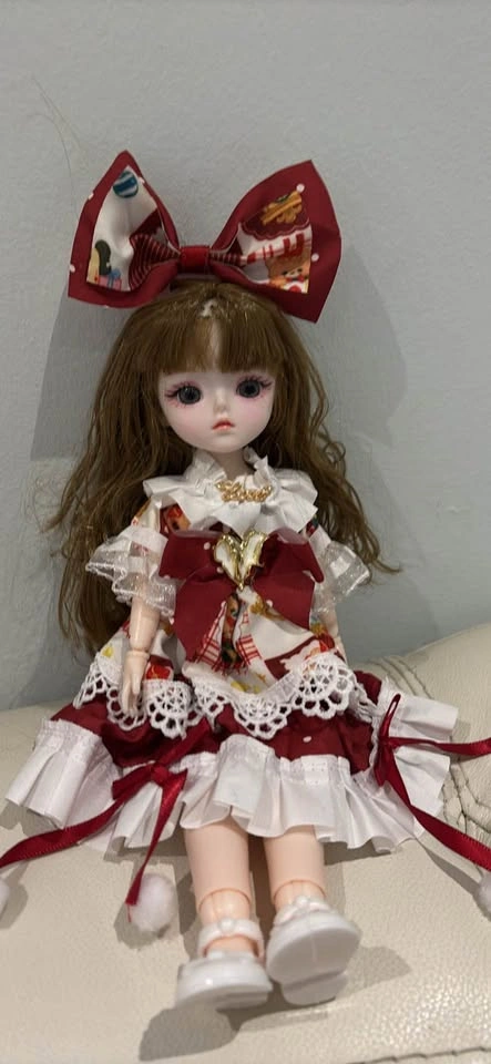 Cute Doll with Pink Striped Dress and Hat