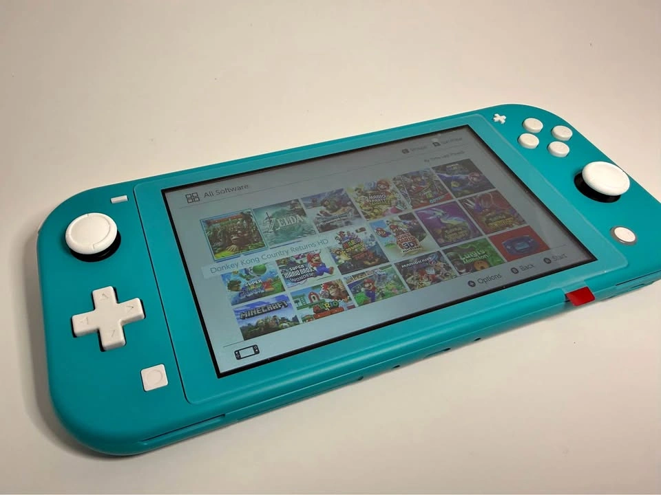 Jailbreaked Nintendo Switch Lite - 128GB SD card full of Games!