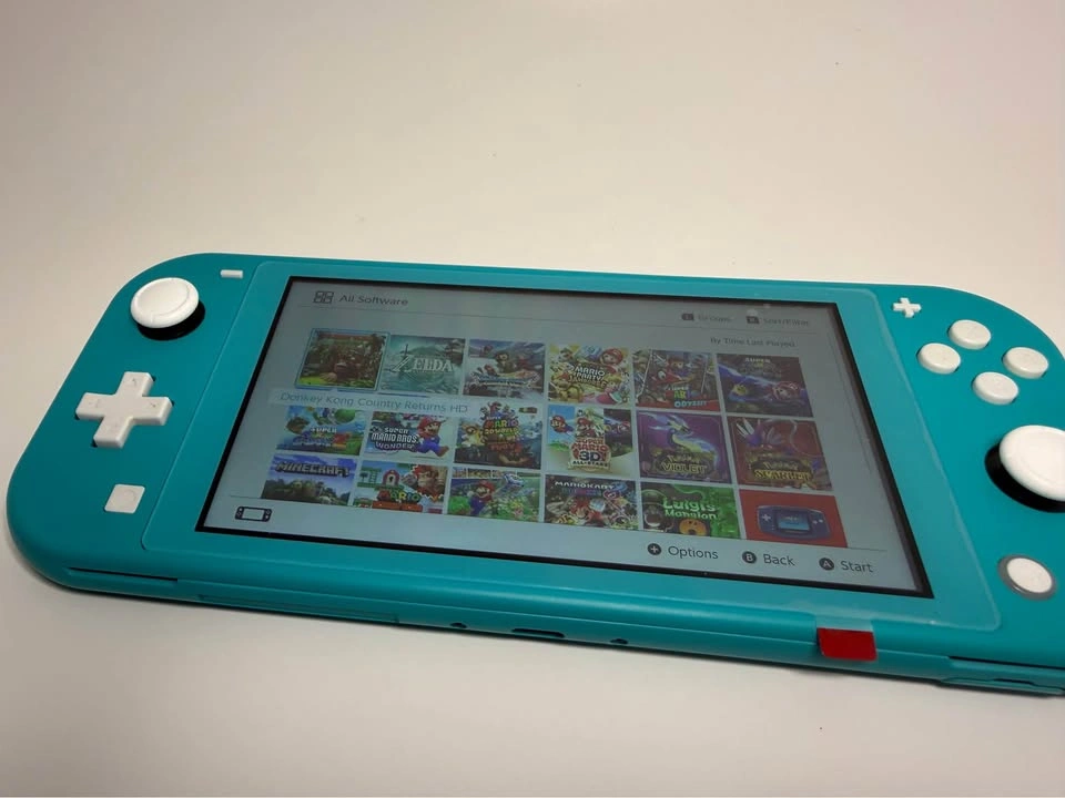 Jailbreaked Nintendo Switch Lite - 128GB SD card full of Games! - photo 5