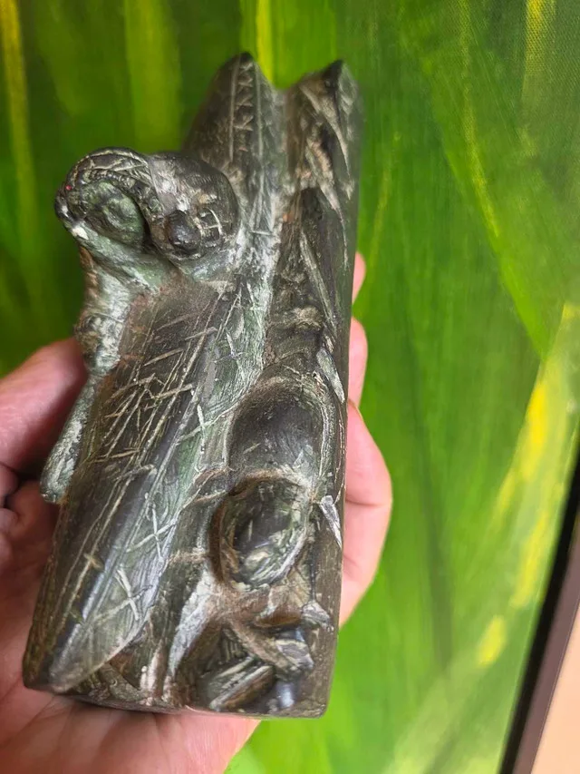 Inuit style carving with hunter in kayak image indicator(2)