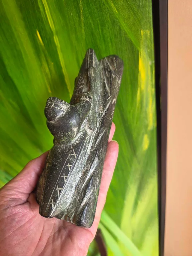 Inuit style carving with hunter in kayak image indicator(3)