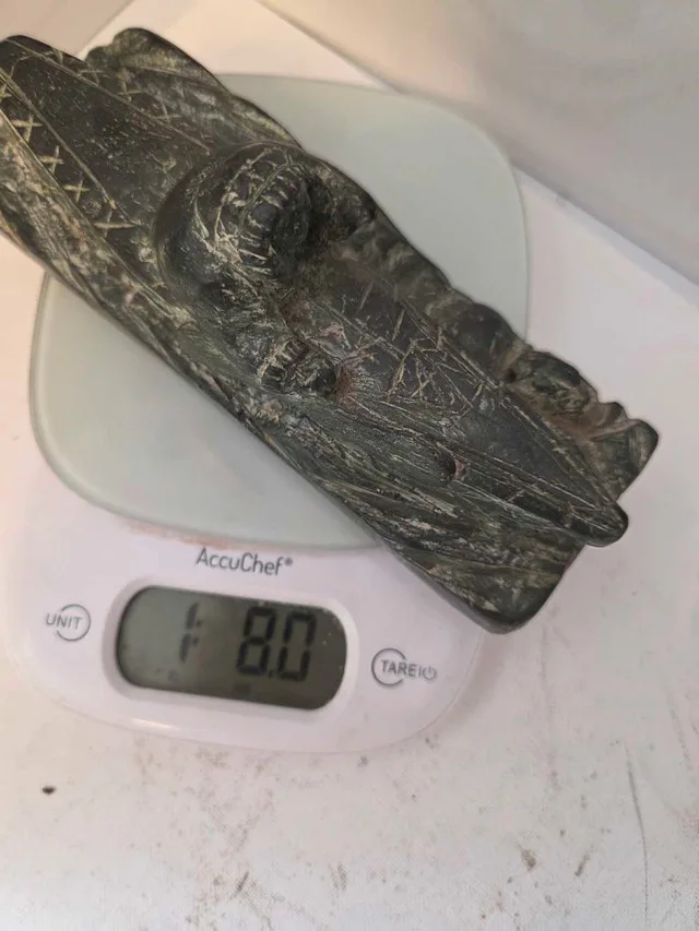 Inuit style carving with hunter in kayak image indicator(5)