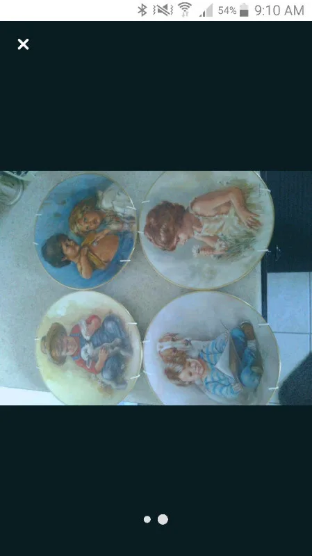 8 collectable plates. Norman Rockwell image indicator(2)