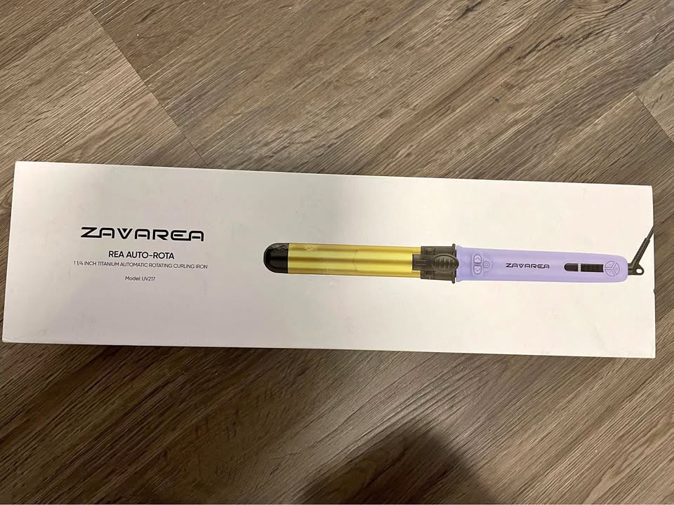 Rotating curling wand
