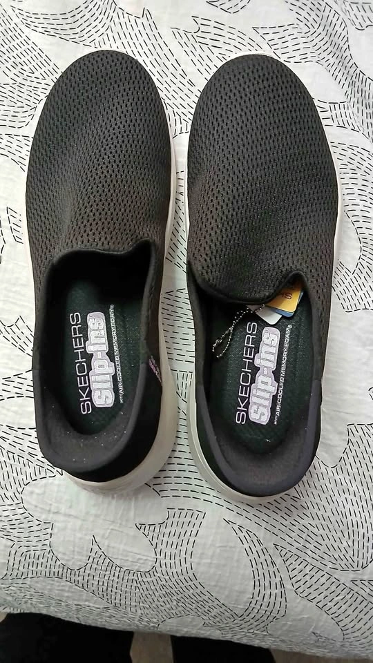 Brand new Skechers slip-ins Black