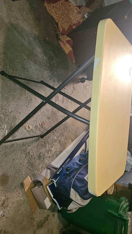 Folding table, cream top, black legs