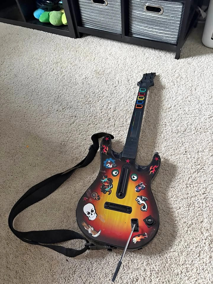 Guitar Hero guitar controller with custom stickers