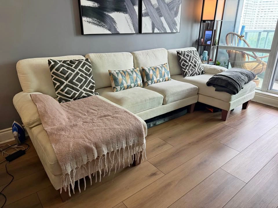 U-shaped cream sectional sofa