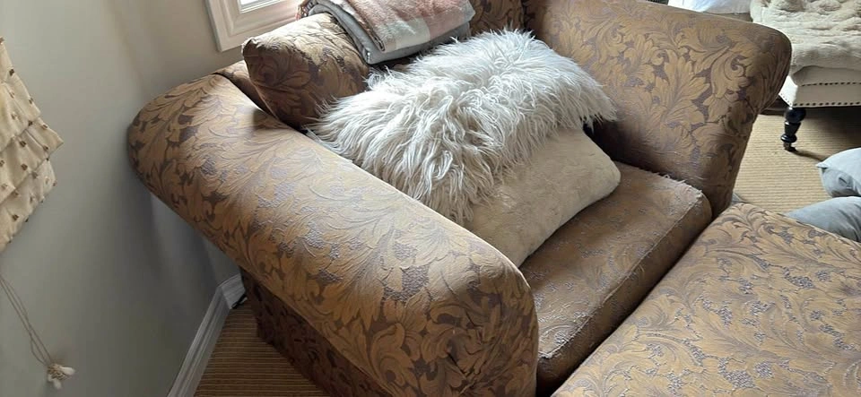 Chair and a half with Ottoman.