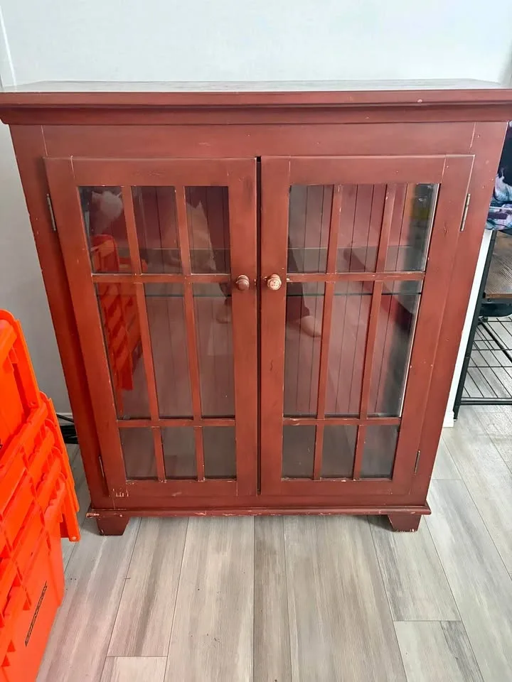 Cabinet with glass doors and shelves