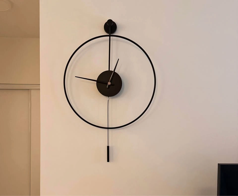 Matte black modern metal wall clock