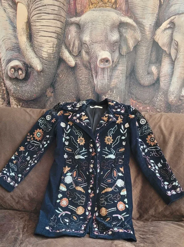 It's a New Vision spring coat thumbnail