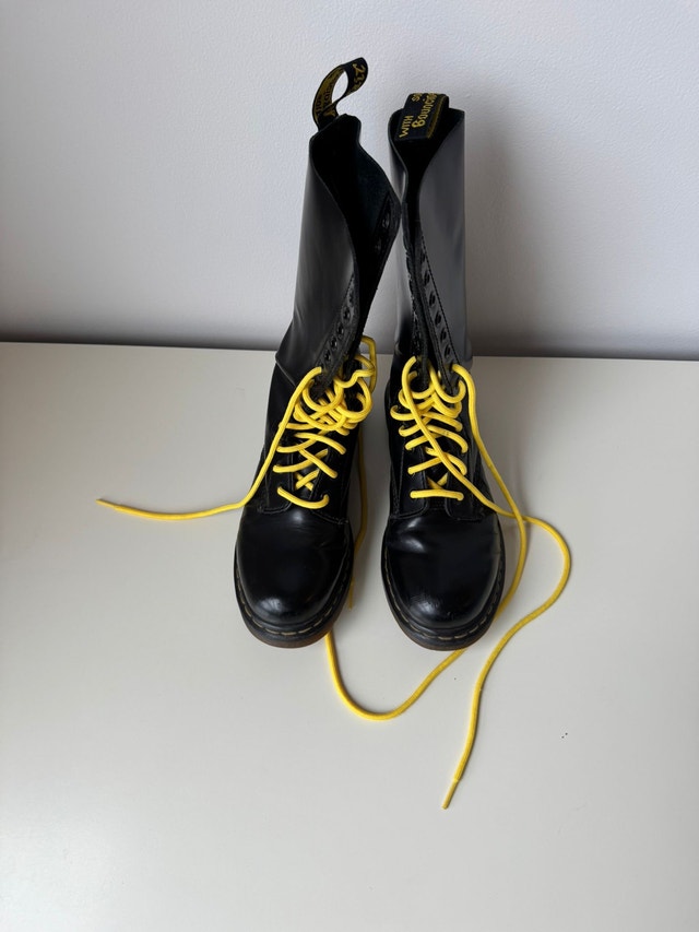 Dr. Martens Black Leather 14-eye Boots with Yellow Laces