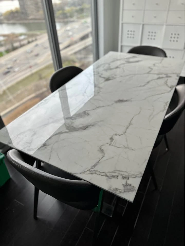 Anqi Marble Dining Table by Wade Logan
