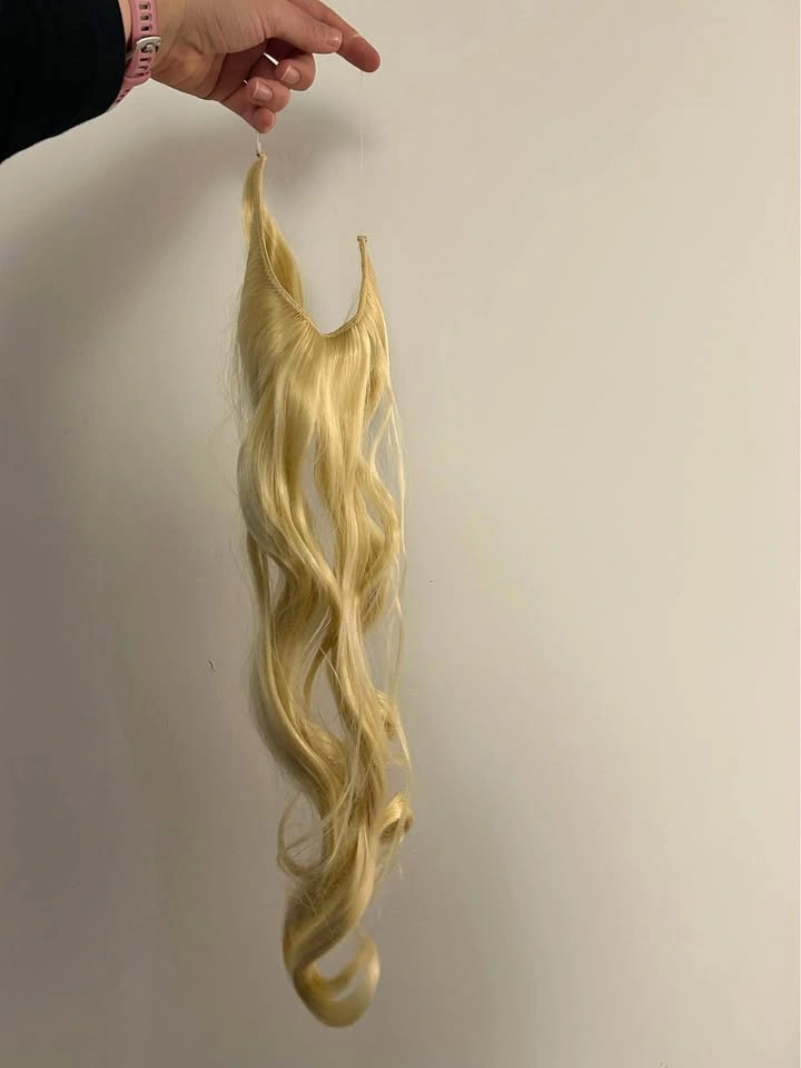 Platinum blonde halo wig hair extensions