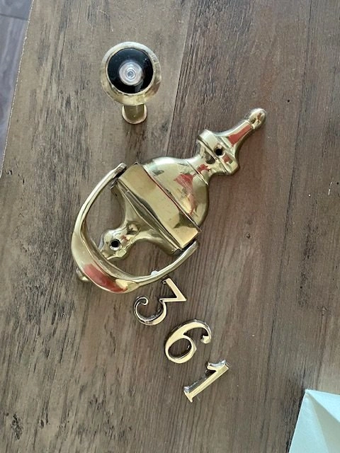 Door knocker, peephole and numbers