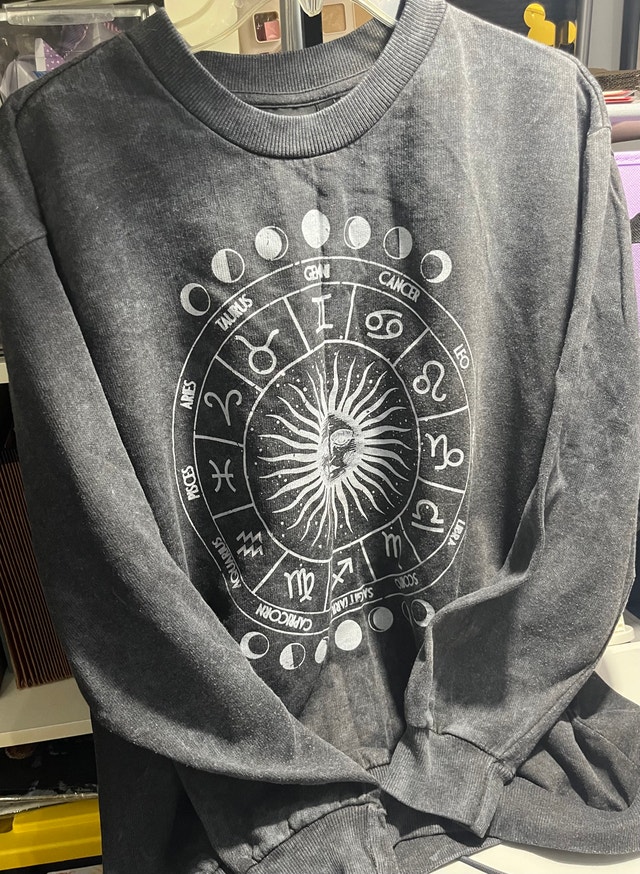 Graphic pull over sweater