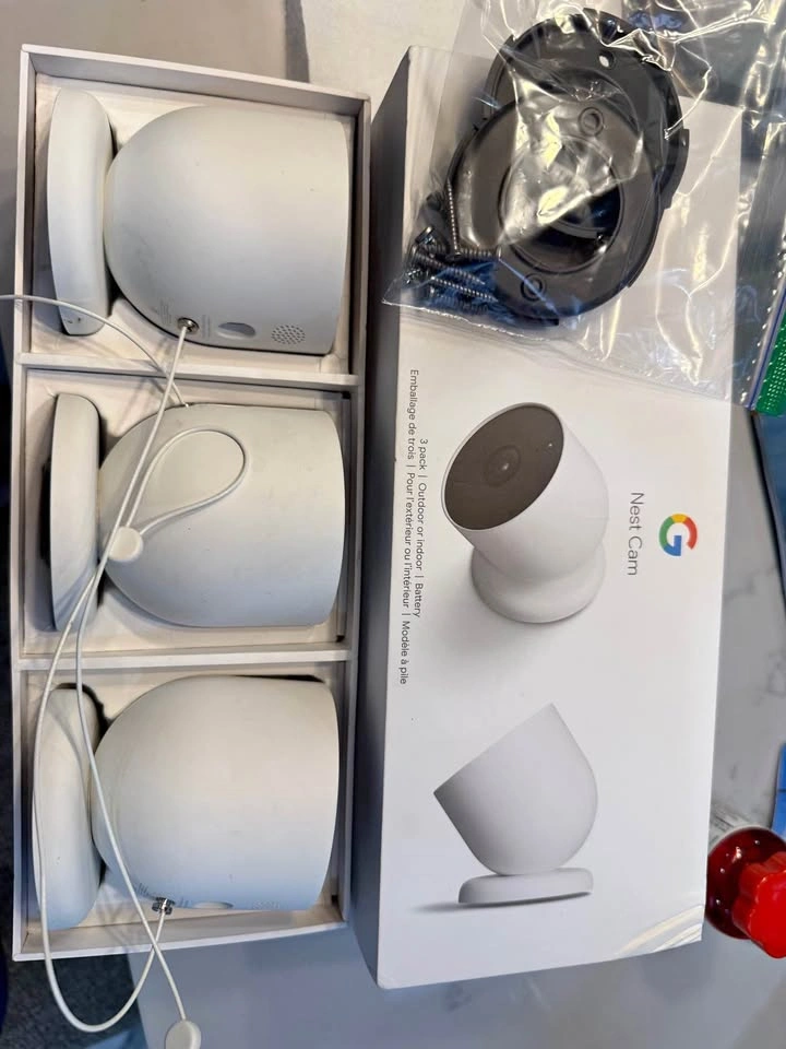Wireless cameras and wired camera doorbell