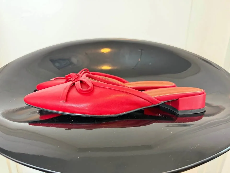 Red pointed toe mules with bow