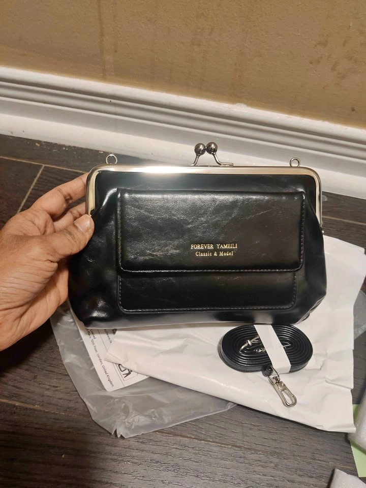 Brand new beautiful small black color wallet with strap for wome