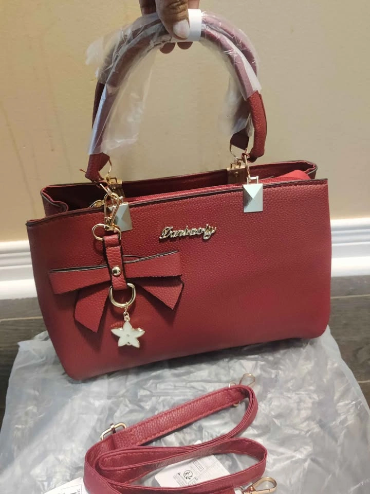 Brand new beautiful crimson color medium size hand bag for women - photo 2