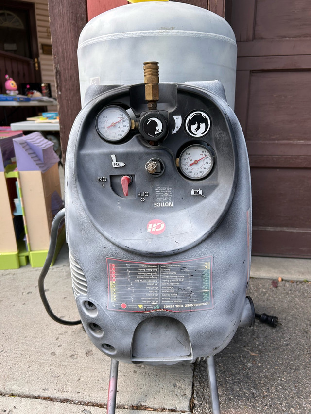 1.7 Hp 22 gallon Campbell Huasfeld Compressor