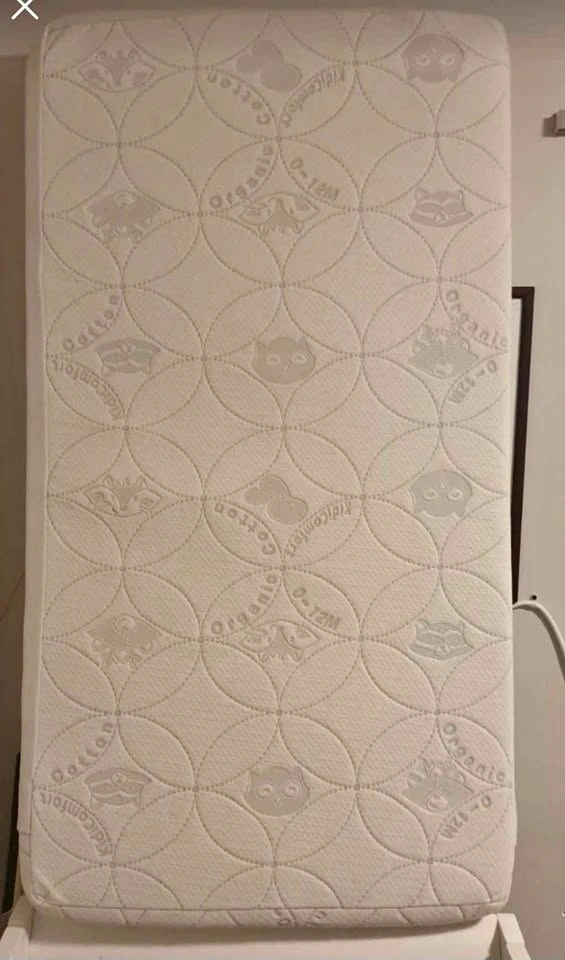 Baby crib with mattress