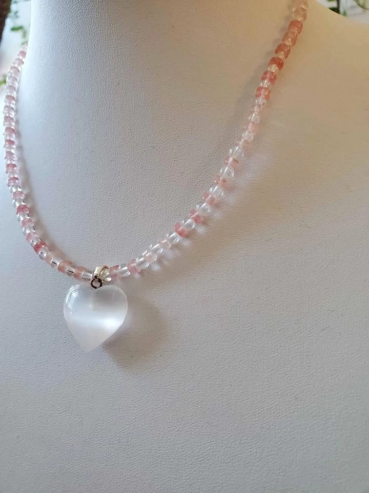 Rose quartz crystal necklace with heart of selenite