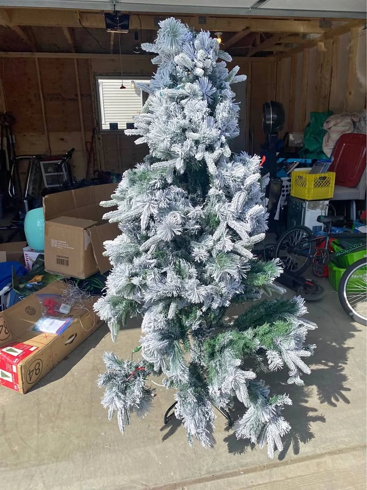 6 foot flocked prelit Christmas Tree