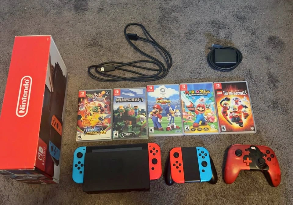 Nintendo Switch + Extra Joy-Cons + Pro Controller + 5 Games