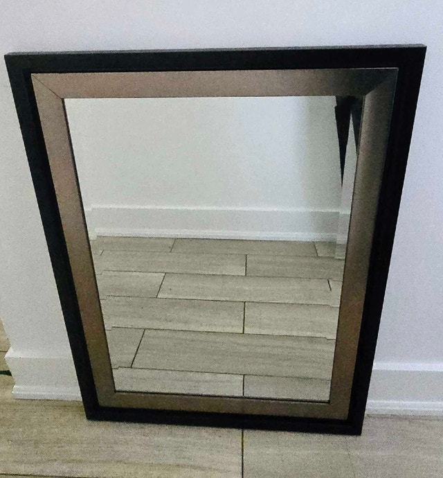 Mirror with black and gold/brass frame