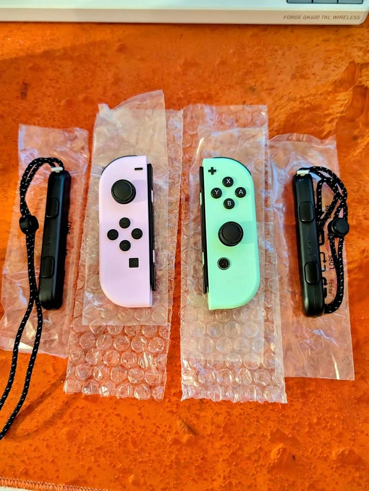 Nintendo Switch Pastel Purple/Pastel Green Joycons (Brand New)
