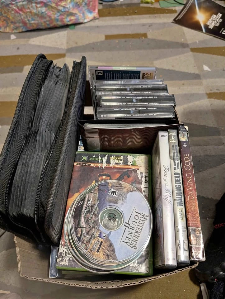 Whole box of DVD's, Xbox, Blu-ray, and PC games
