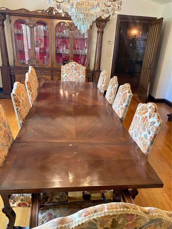 Dining room table with 10 upholstered chairs