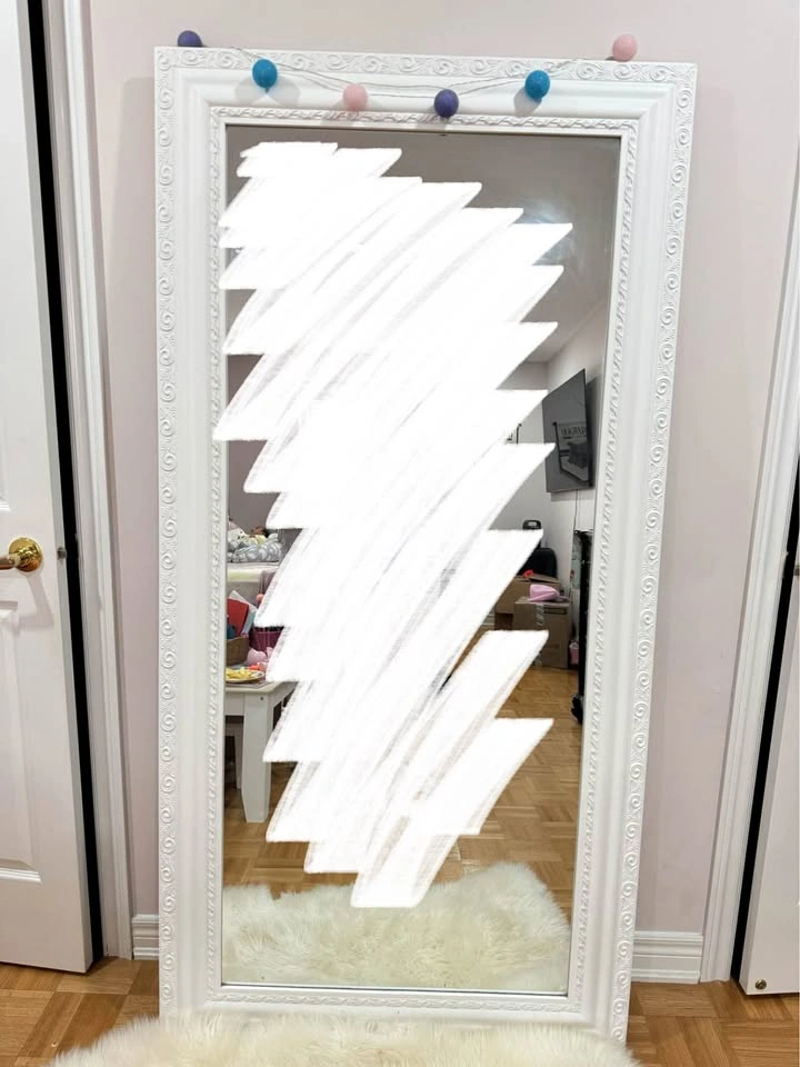 Carved wood frame mirror
