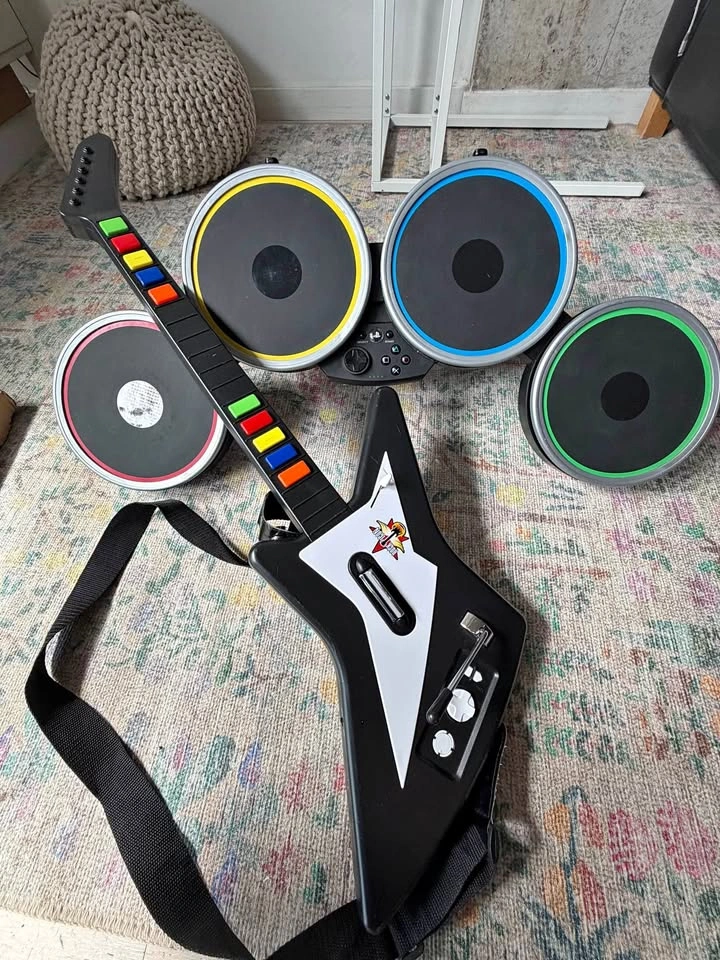Harmonix Drum Set and Intec PS3 Guitar Set