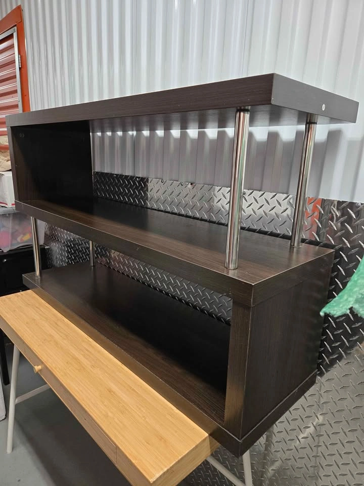 Dark brown shelving unit with metal poles - photo 2